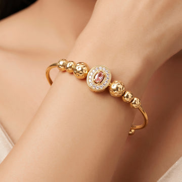 PRAO Bracelet Anti-Tarnish Bangle With Pink Crystal Center And Textured Bead Accents (Adjustable Size)