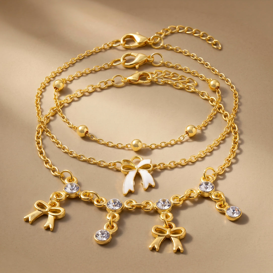 PRAO 3 Bracelets Anti-Tarnish Gold Plated Bows And Crystals Set (Adjustable Size)